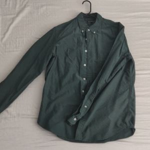 Green button down shirt